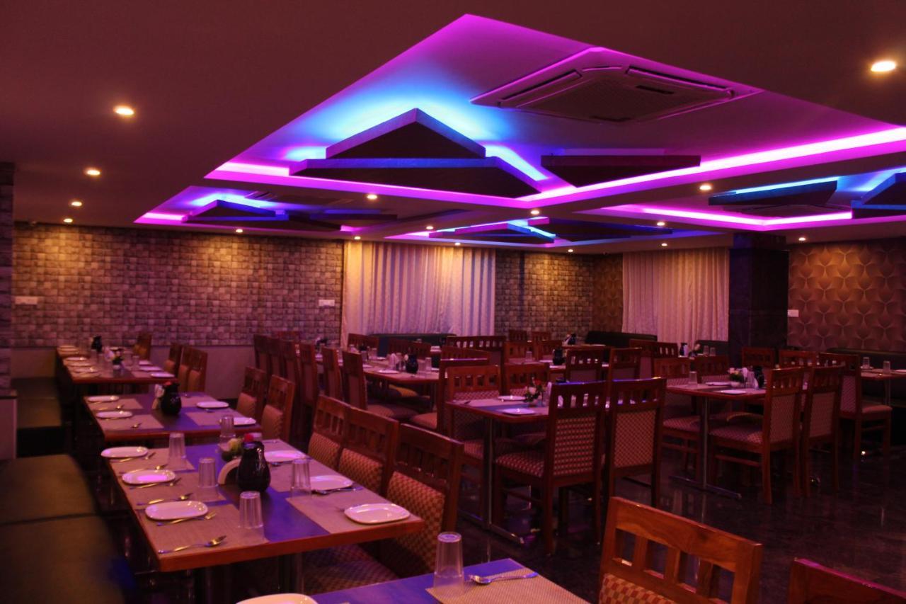 Golden Pride Hotel Kanakapura Exterior photo